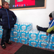 Justin Roberson, age 6, and Mychal Adams, 1, wait on a stack of bottled water at a rally where the Rev. Jesse Jackson was speaking about the water crisis at the Heavenly Host Baptist Church in Flint, Mich., Jan. 17, 2016.
Bill Pugliano/Getty Images